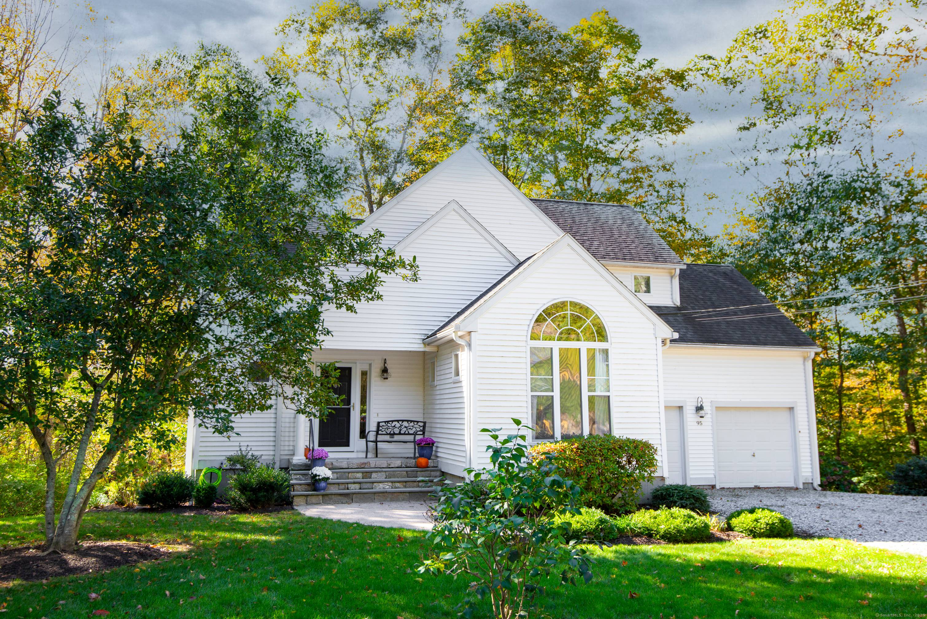 One of five custom homes set in the enclave of Queen's Gate.