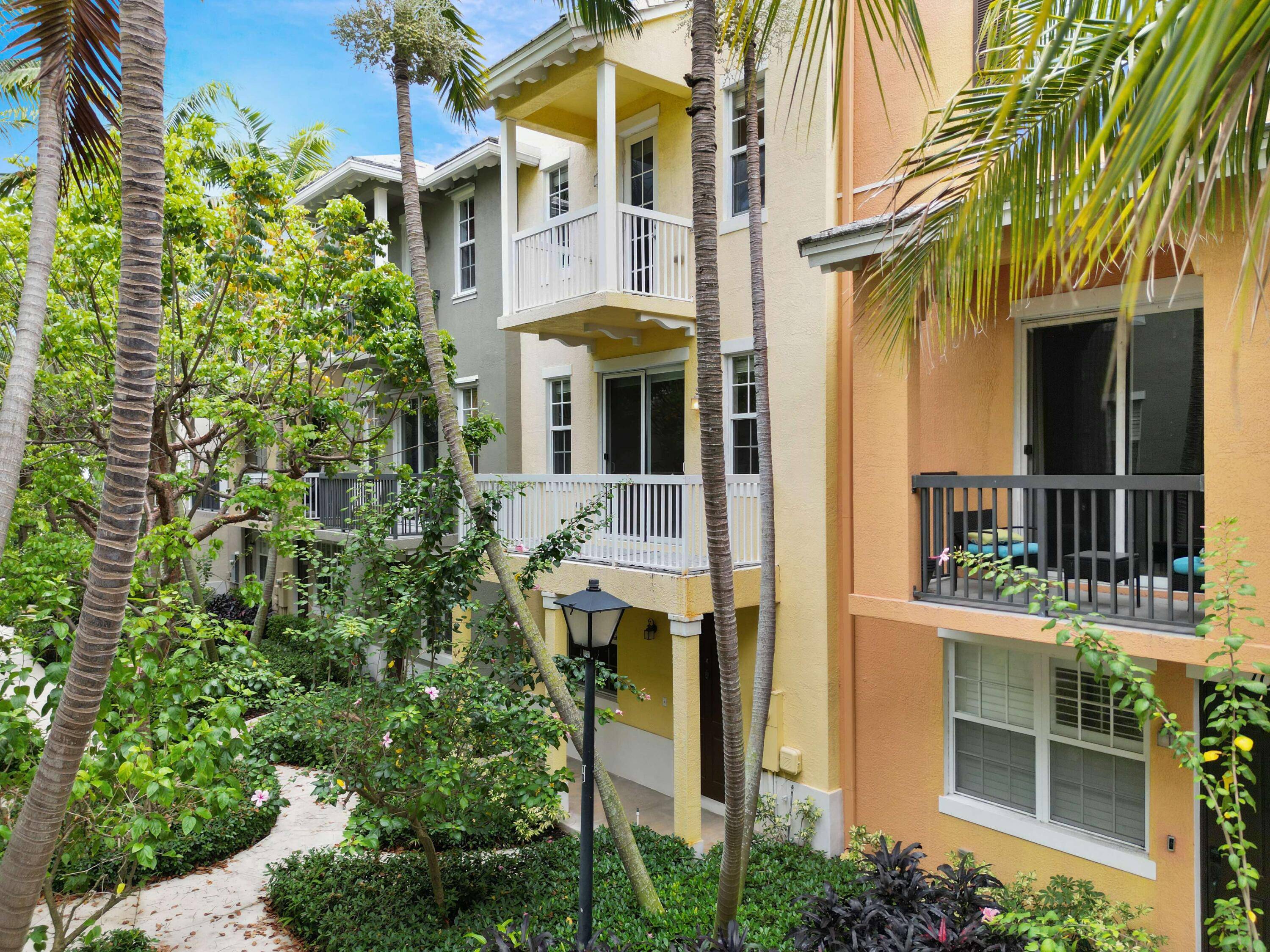 Experience the best of Delray Beach living in this 3 level townhome, walking distance from the vibrant downtown scene.
