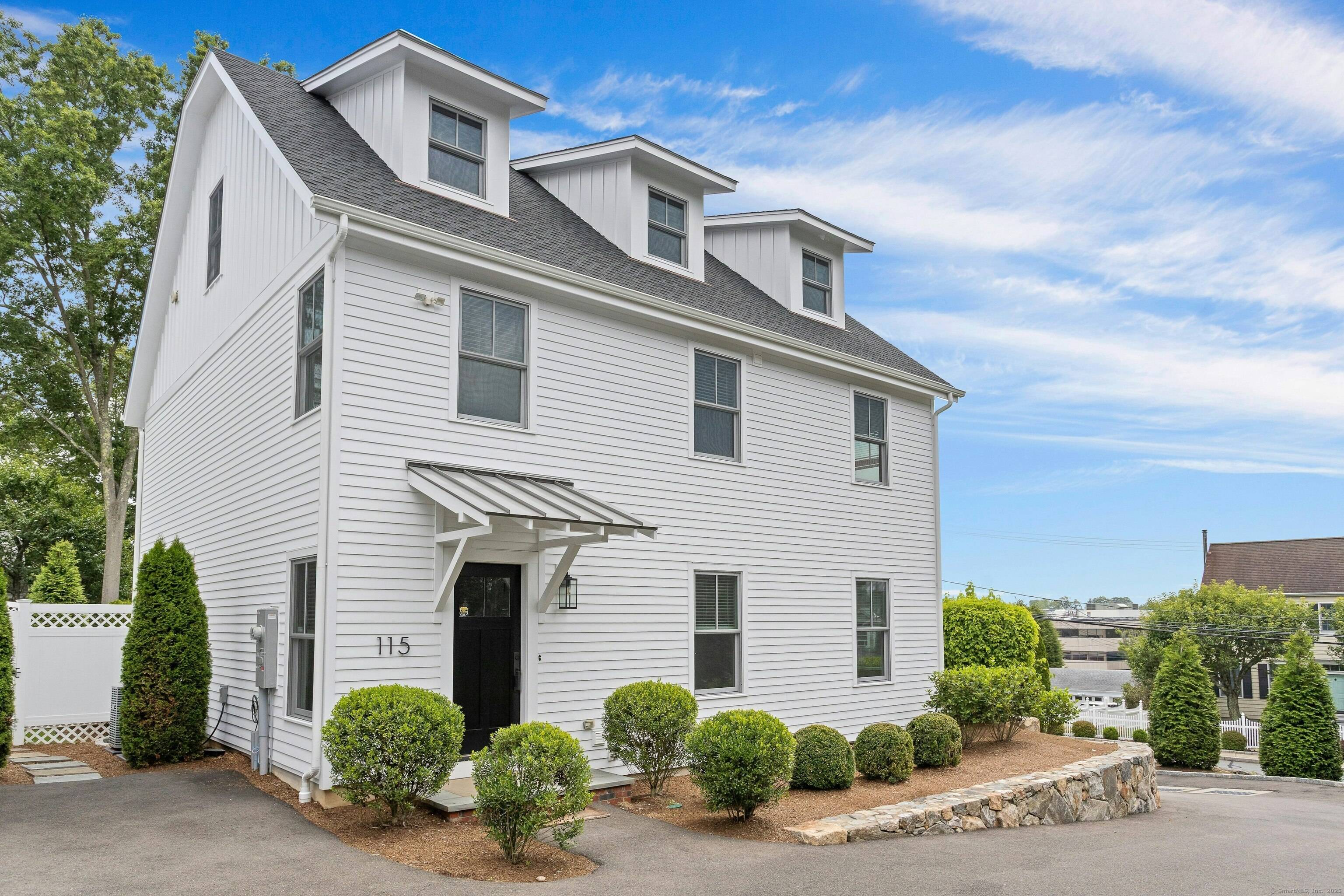 Set just blocks from grocery stores, shops, restaurants, and the train, this 5 bedroom, 4.