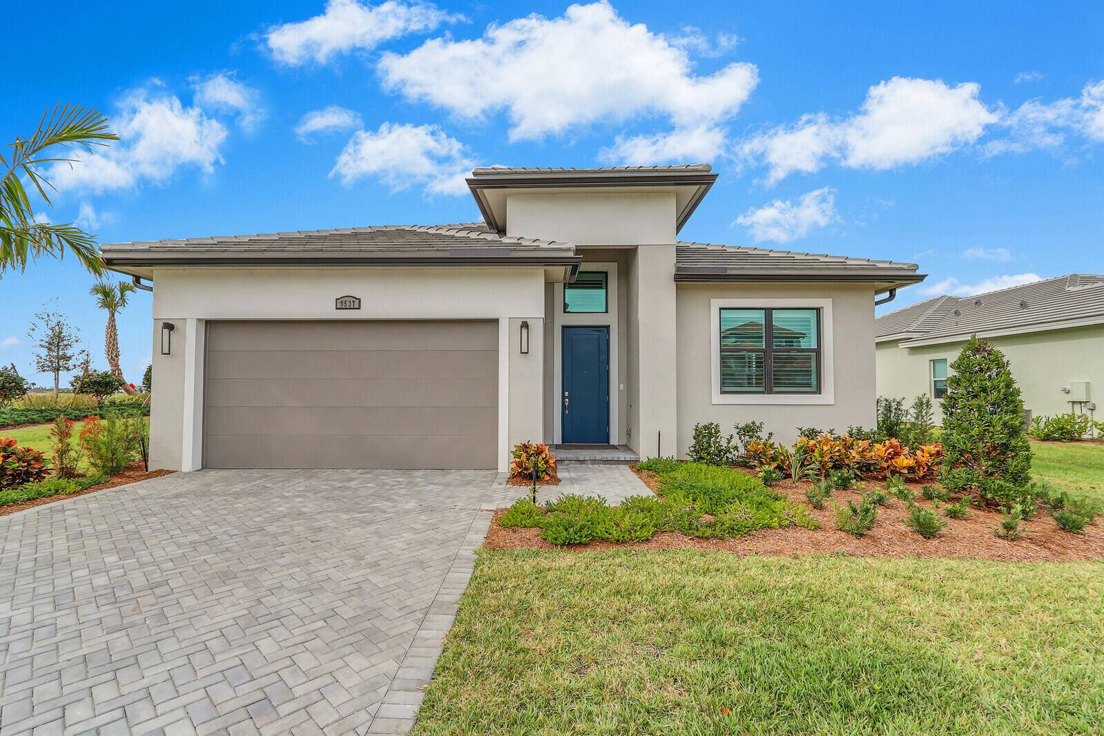 This Julia floor plan great room concept home offers two spacious master suites, 2.