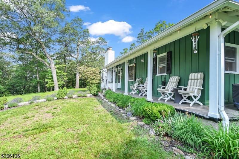 Retreat to this serene and spacious ranch style home, privately nestled on 29 acres of pristine, wooded land.