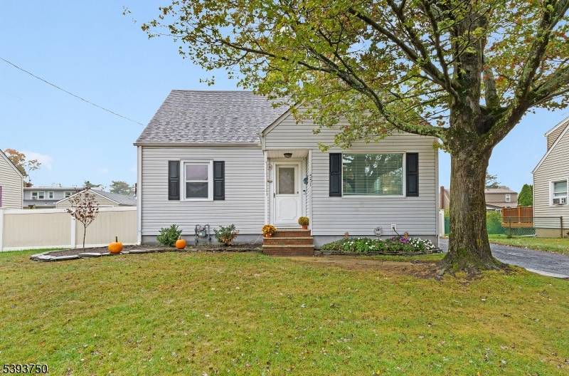 Move in Ready Cape Cod on a Tree Lined Street !