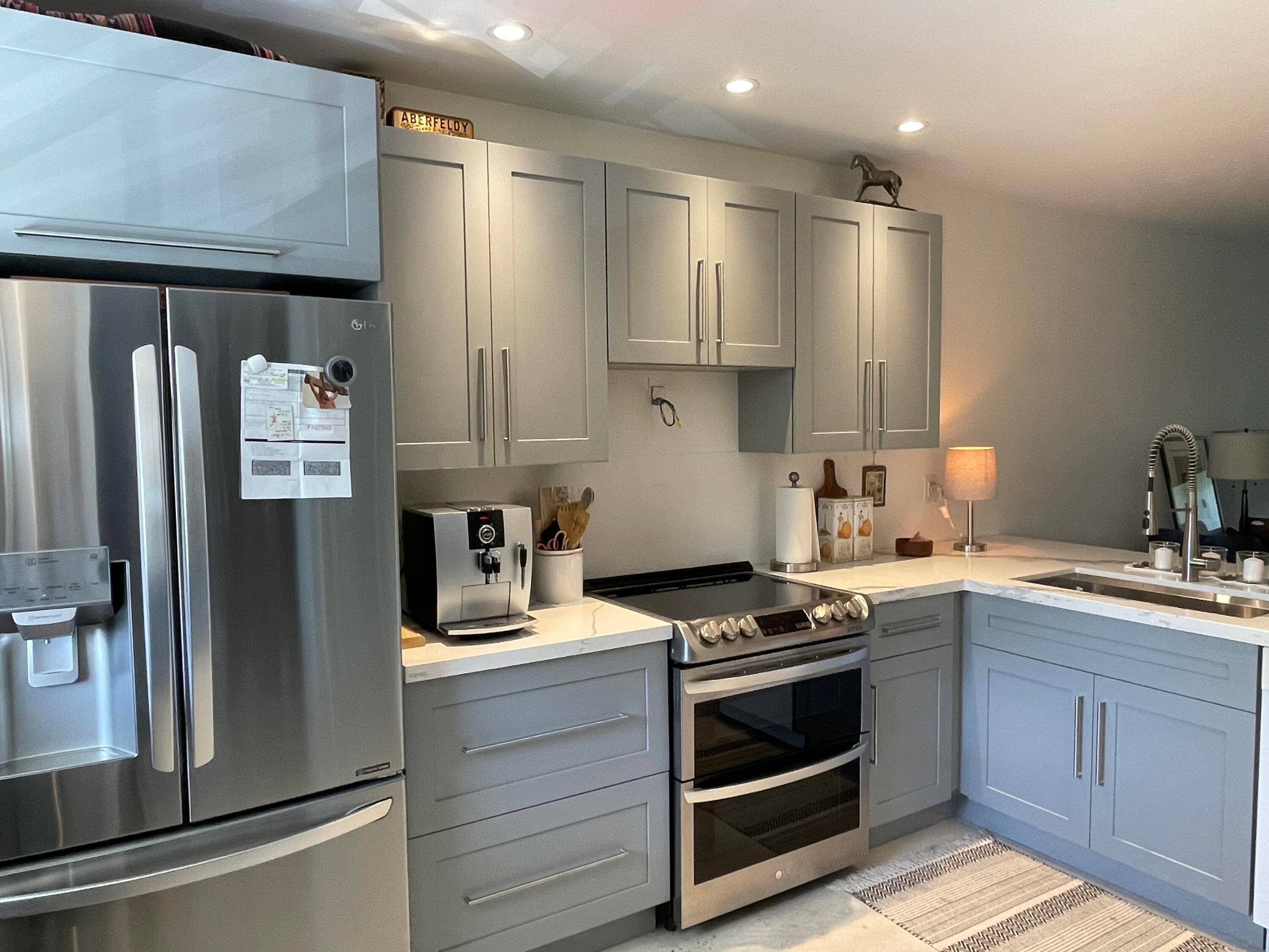 COMPLETELY RENOVATED UNIT IN A VERY SOUGHT 55 COMMUNITY, IMPACT WINDOWS, NEW ENTRANCE DOOR, TOP OF THE LINE STAINLESS STEEL APPLIANCES, KITCHEN OPEN TO LIVING AREAS.