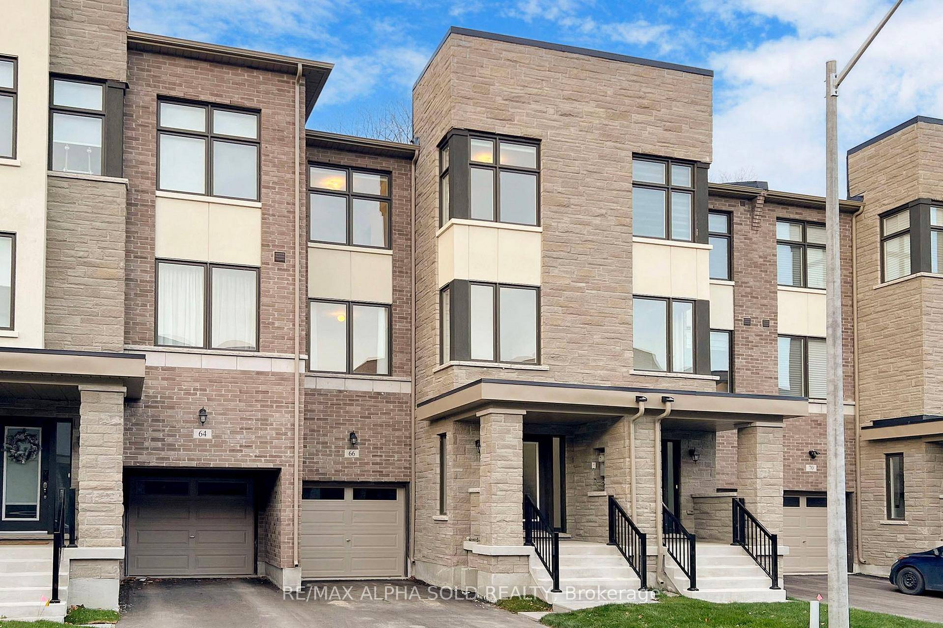MUST SEE ! ACT NOW ! 3 Storey MODERN TOWNHOUSE, 2456 SQFT BASEMENT, On A Quiet Street.