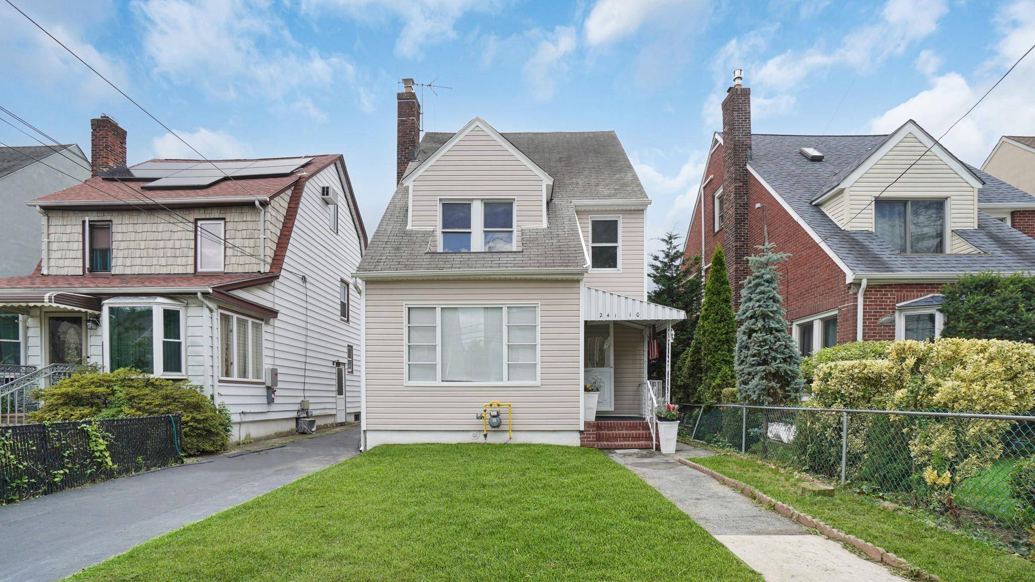 Welcome to 241 10 86th Avenue a beautifully renovated home located on a quiet, tree lined block in the heart of Bellerose.