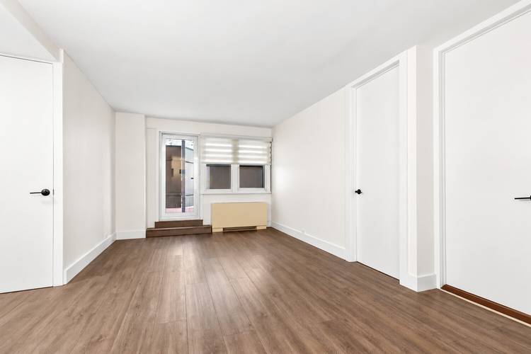 Fully renovated 1BR 1BA with private outdoor space, available for a November 1 lease start.
