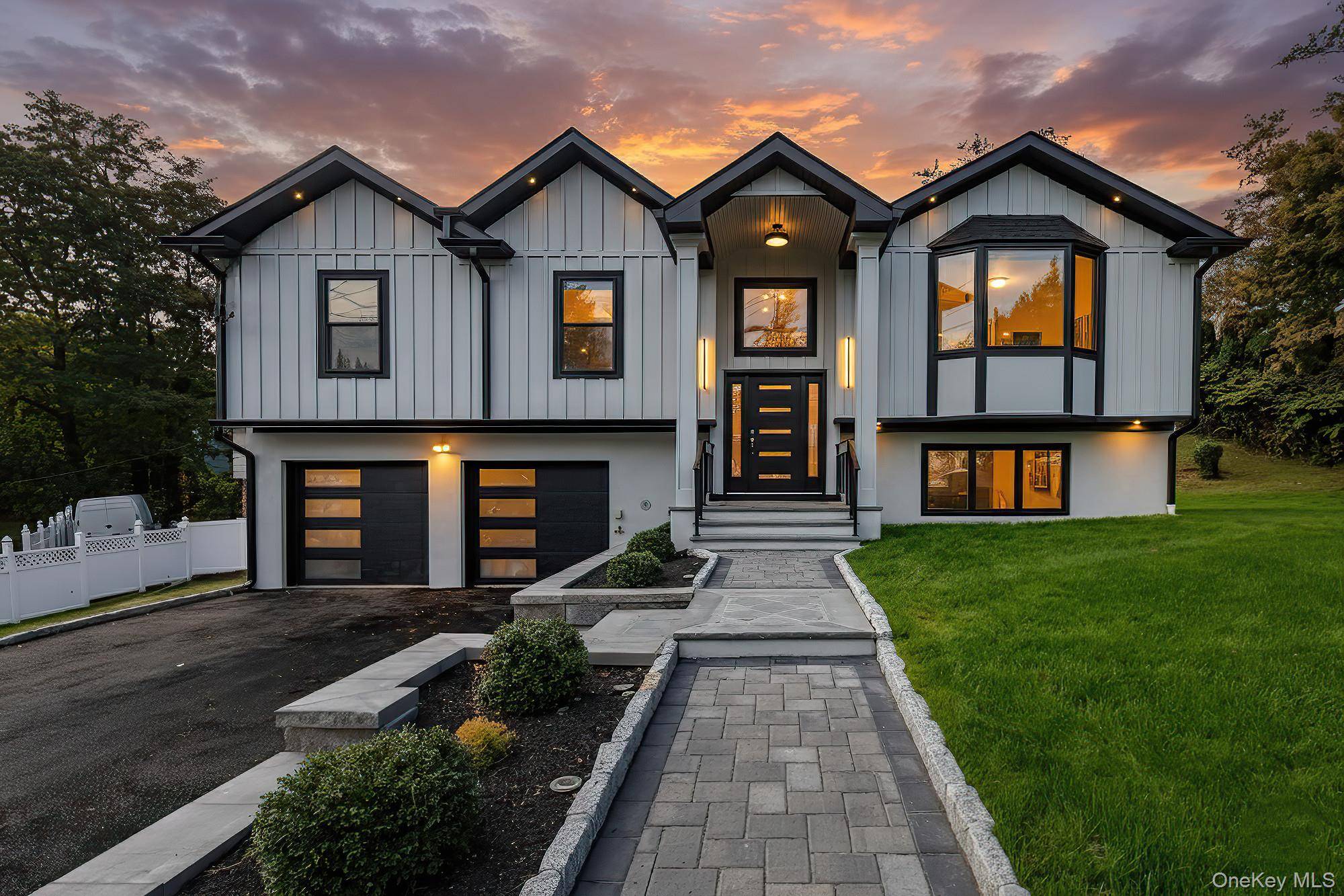 Step into modern elegance at 9 Stadium Road, where every inch of this stunning 4 bedroom, 3 bath residence has been thoughtfully reimagined.