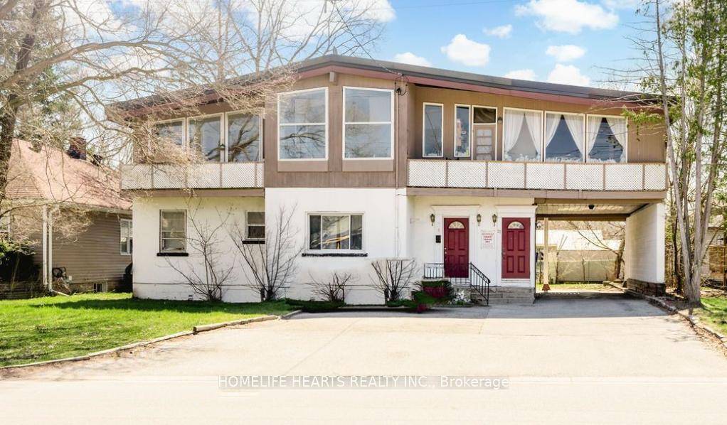 Welcome To 37 Donald Street, A Charming And Newly Renovated 4 Plex Apartment Nestled In The Heart Of Barries Desirable Queens Park Neighborhood.