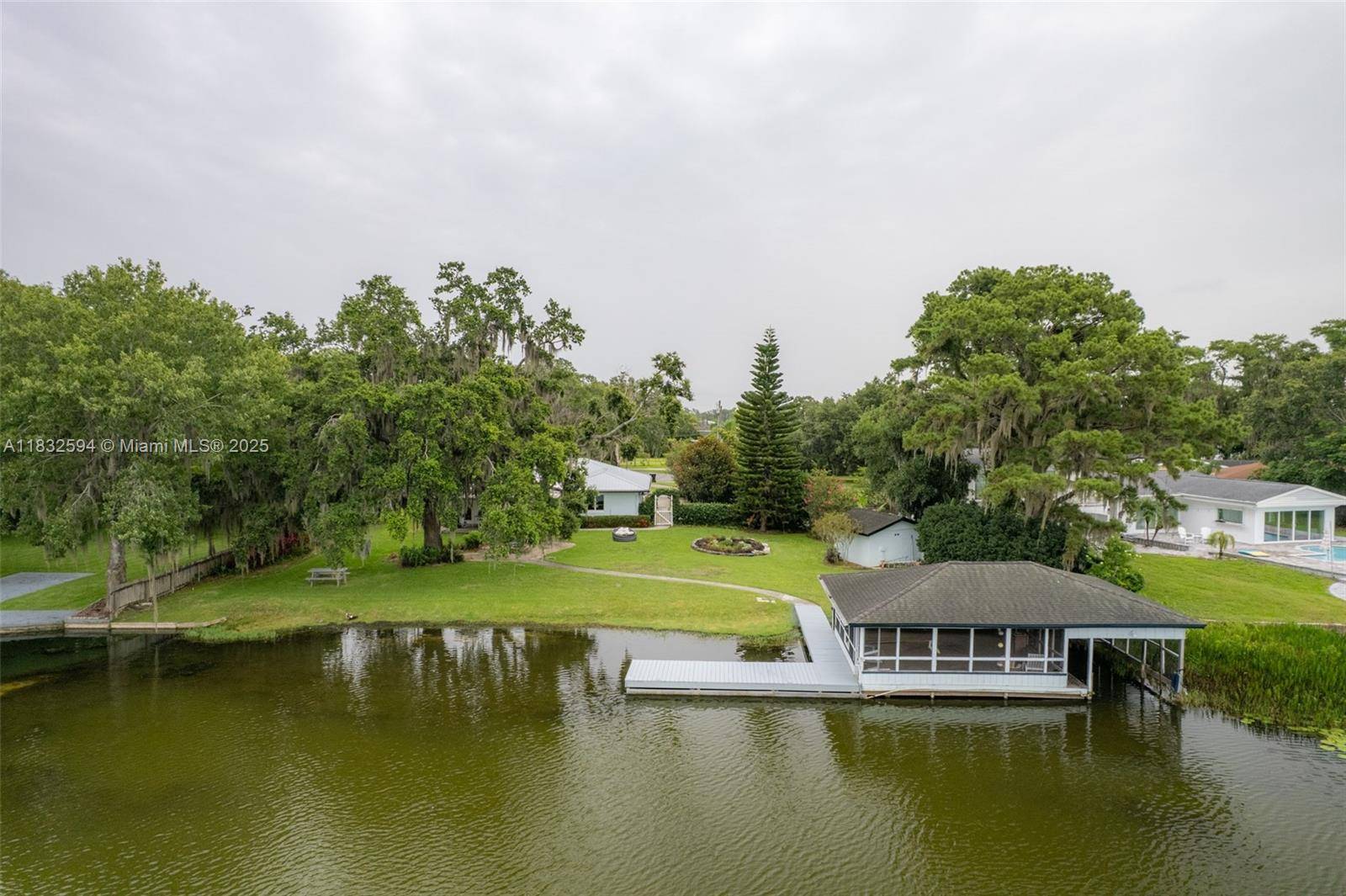 SPECTACULAR LAKEFRONT HOUSE WITH BOAT HOUSE.
