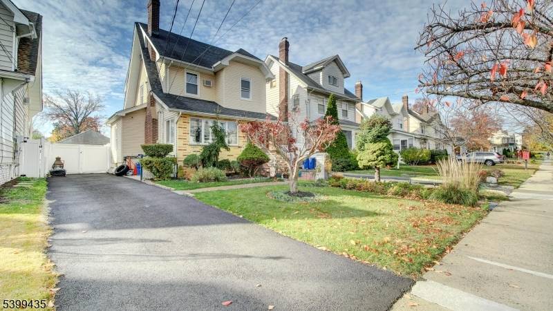 Welcome to this charming Colonial style home featuring Five bedrooms and two and a half appointed bathrooms.