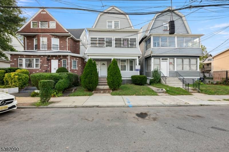 Discover 19 Dover St, a spacious two family home in Newark offering strong potential for both investors and owner occupants.