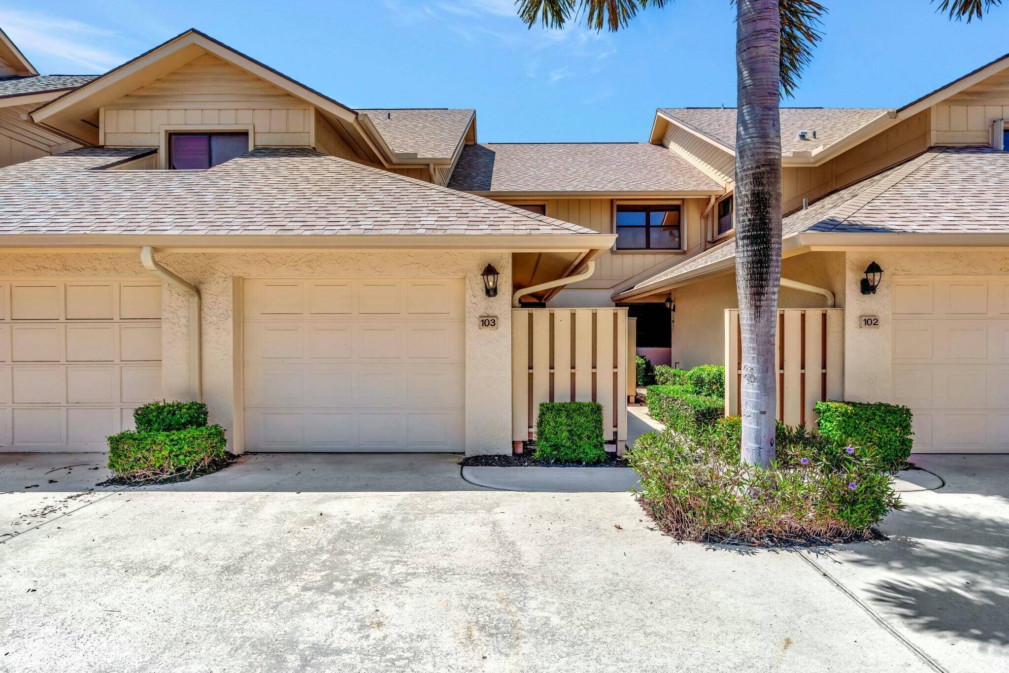 Stunning First Floor Condo with Garden Views and Expanded Living Space in Waterbend at Jonathan's Landing, Jupiter !