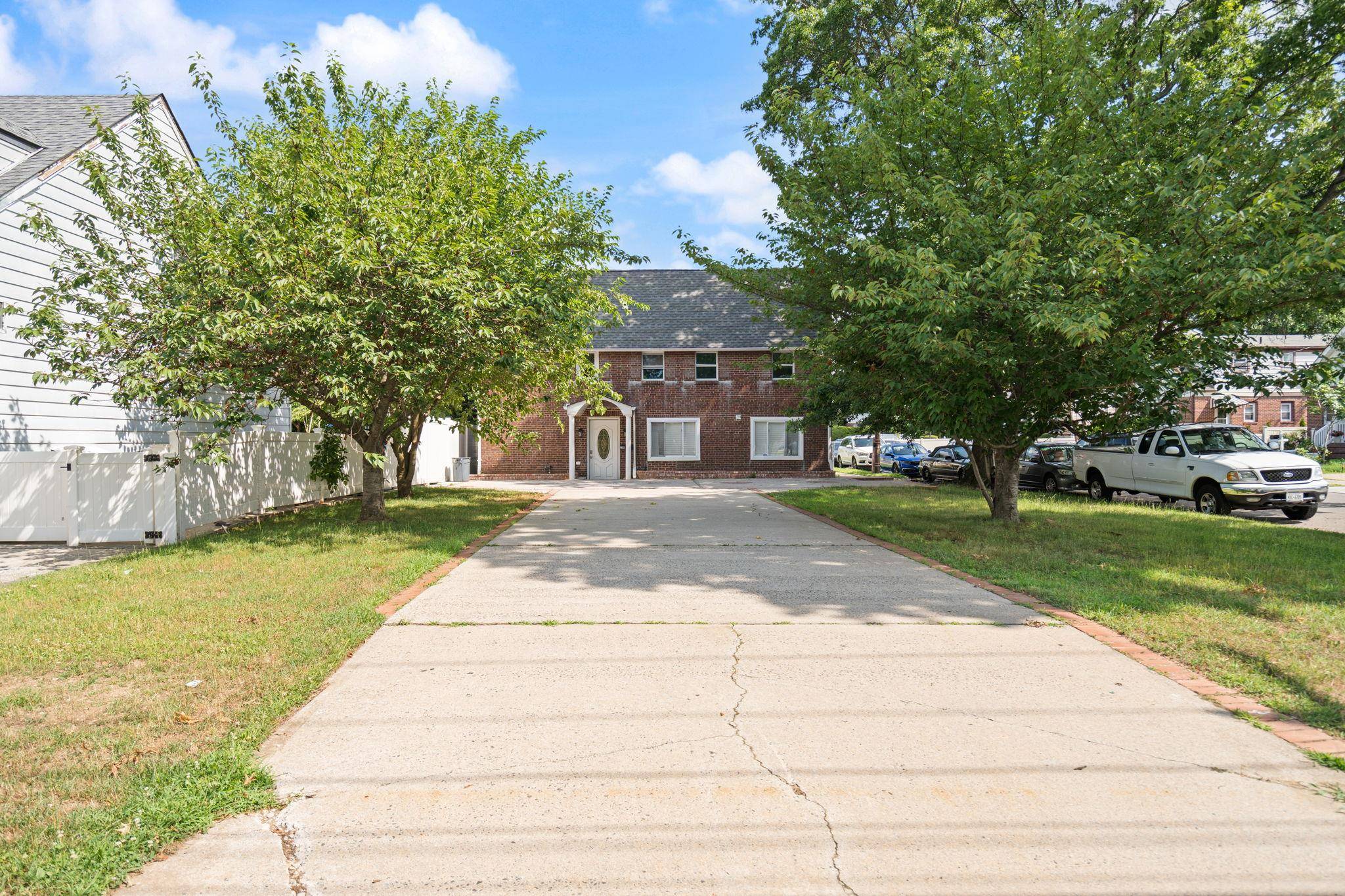 Welcome to this beautifully renovated Colonial style residence that seamlessly blends timeless charm with modern updates.