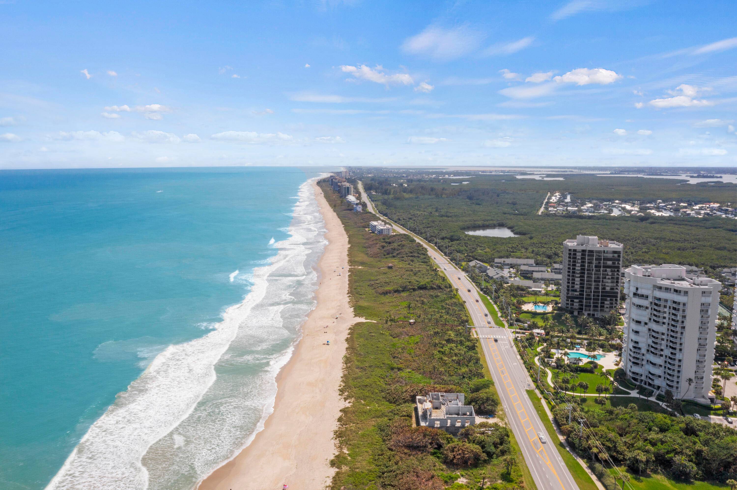 Luxury living in this stunning oceanfront condo on the NE corner 14th floor, offering panoramic views of the ocean river.