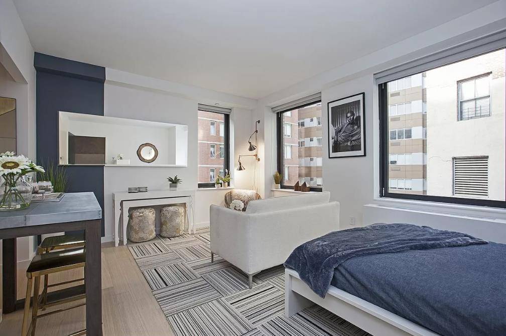 Beautiful, High Floor, Spacious Studio Apartment Featuring Large Living and Separate Changing Area, Two Large Custom Closets, Oversized Windows, Solar Shades, Walk in Shower and Beautiful Full Size Kitchen with ...