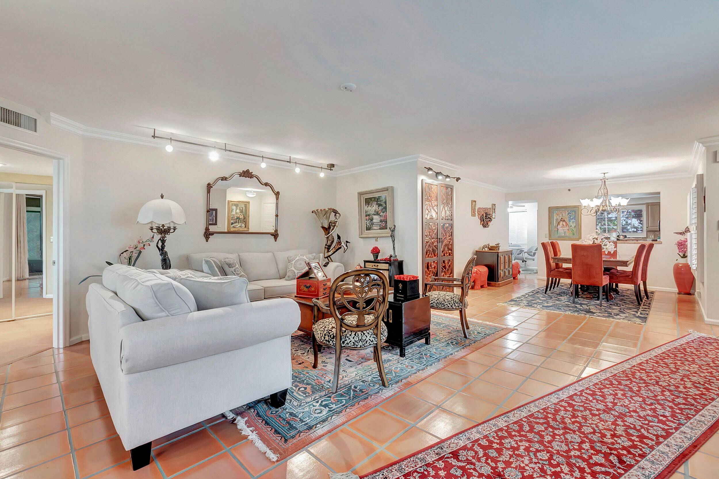BEYOND BELIEF, THIS FIRST FLOOR BOBBY JONES2 BEDROOM 2 BATH PLUS DEN CONDO OVERLOOKING TRANQUIL LAKE AND SOOTHING WATER FOUNTAIN.