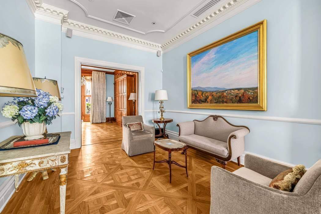 Set behind an elegant wrought iron gate, this townhouse exemplifies refined luxury with an unmistakable sense of timeless sophistication.
