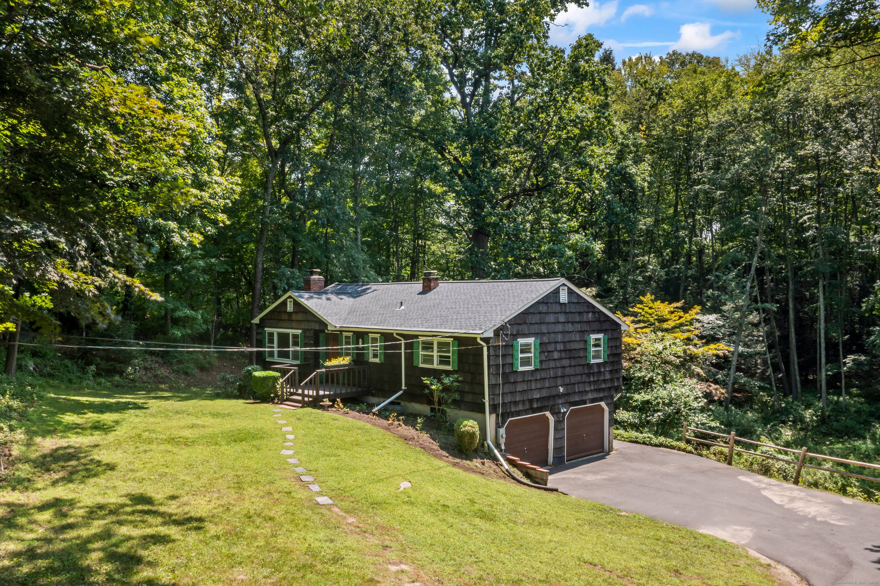 Open and airy 3 bedroom 2 full bath ranch home with central air and 2 car garage.