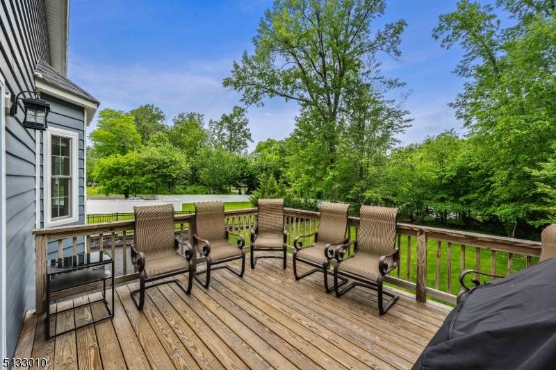 This stunning 6 bedroom, 5 full and 1 half bath Center Hall Colonial offers the perfect blend of elegance, comfort, and modern convenience.