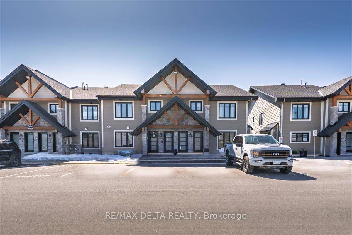 This beautiful end unit, 1st floor condo shows true pride of ownership includes over 25, 000 in upgrades.