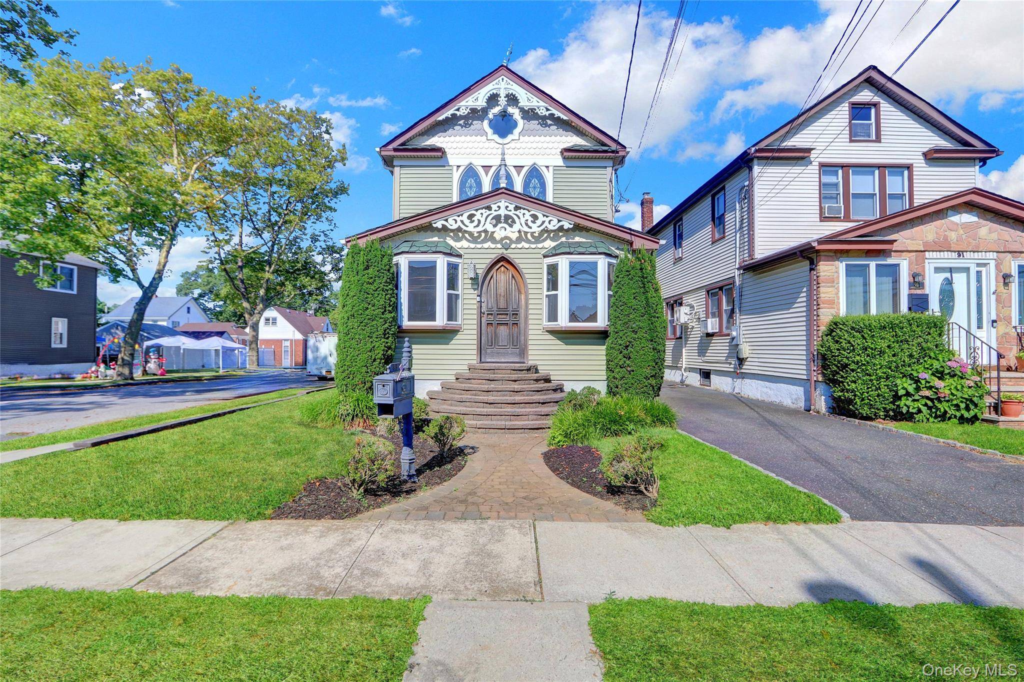 Colonial style home featuring 4 bedrooms, a full bath, formal dining room, den and a one car garage.
