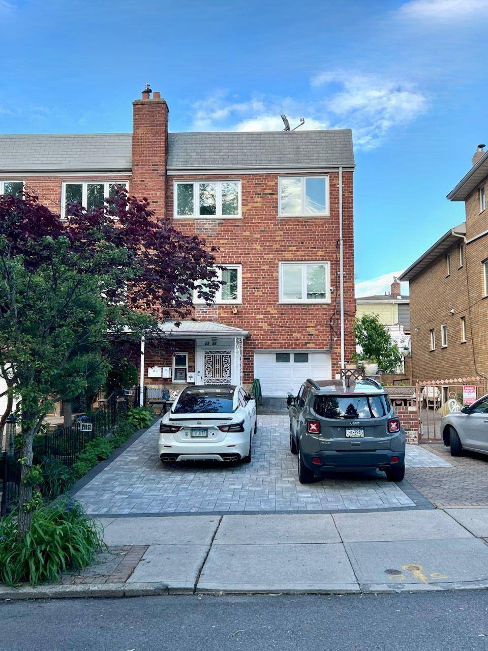 A Very Special Find Legal 3 Family Home with a Backyard and Garage Brick Semi detached 3 Family Home on a tree lined block in the lovely Astoria Heights neighborhood.