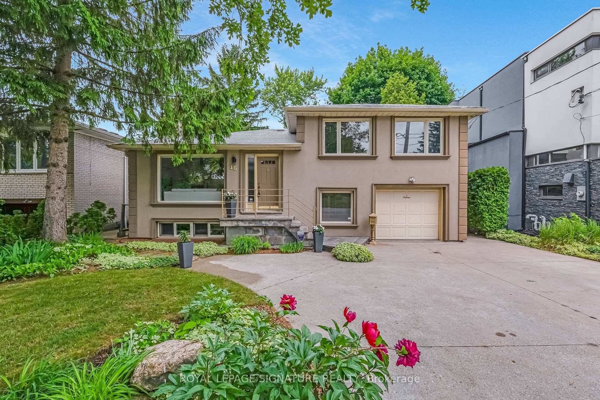 This lovely, custom enlarged, side split home on a gorgeous ravine lot is like nothing you have seen before.