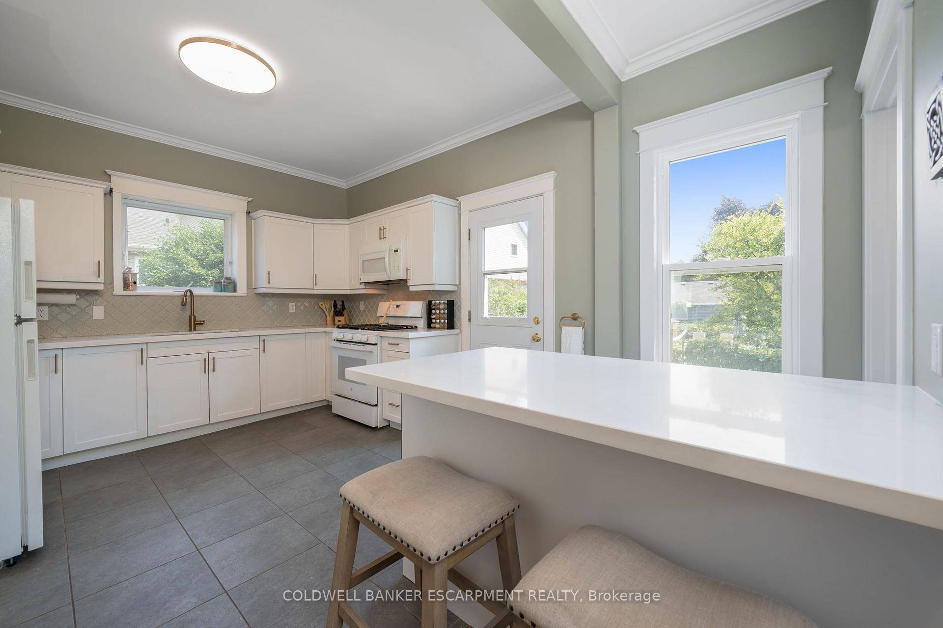 Welcome to 44 Church Street East, Acton, where timeless character meets modern living.