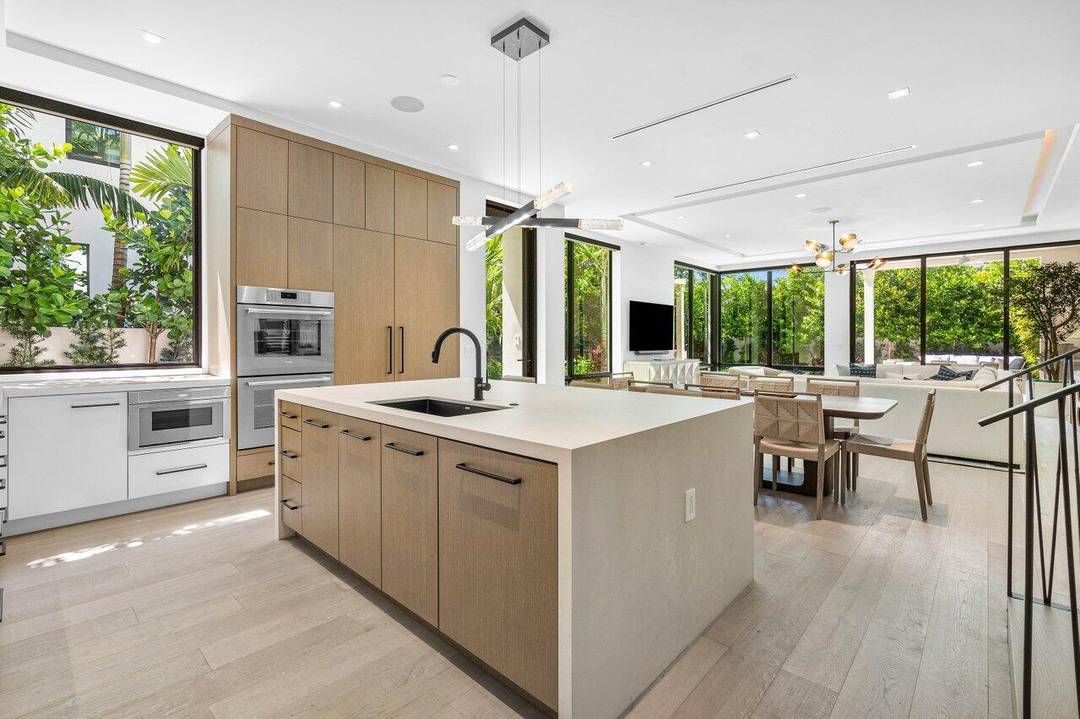 Nestled in Delray Beach's coveted Palm Trail neighborhood, this 4 bedroom, 3.