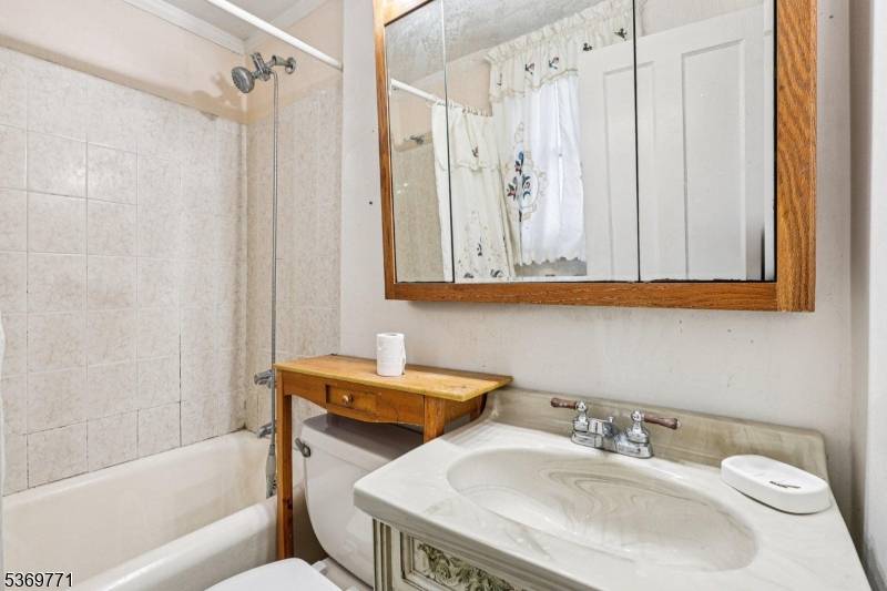 Welcome to 667 Allwood Rd a classic Colonial full of character and opportunity in the heart of Clifton.