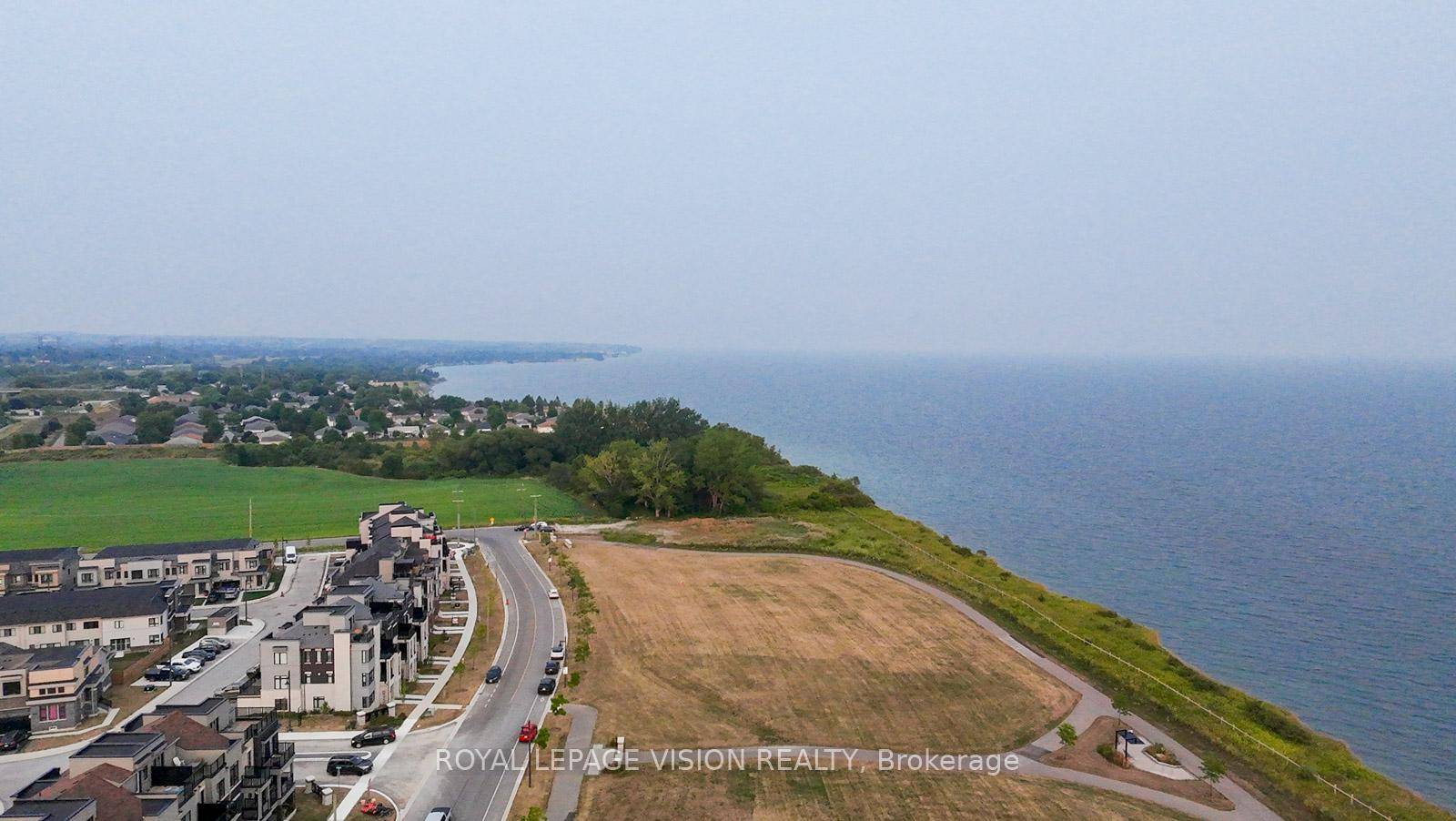 This stunning 3 bedroom, 3 bathroom townhouse is located in the prestigious Lakebreeze community, just steps from the beautiful shores of Lake Ontario.