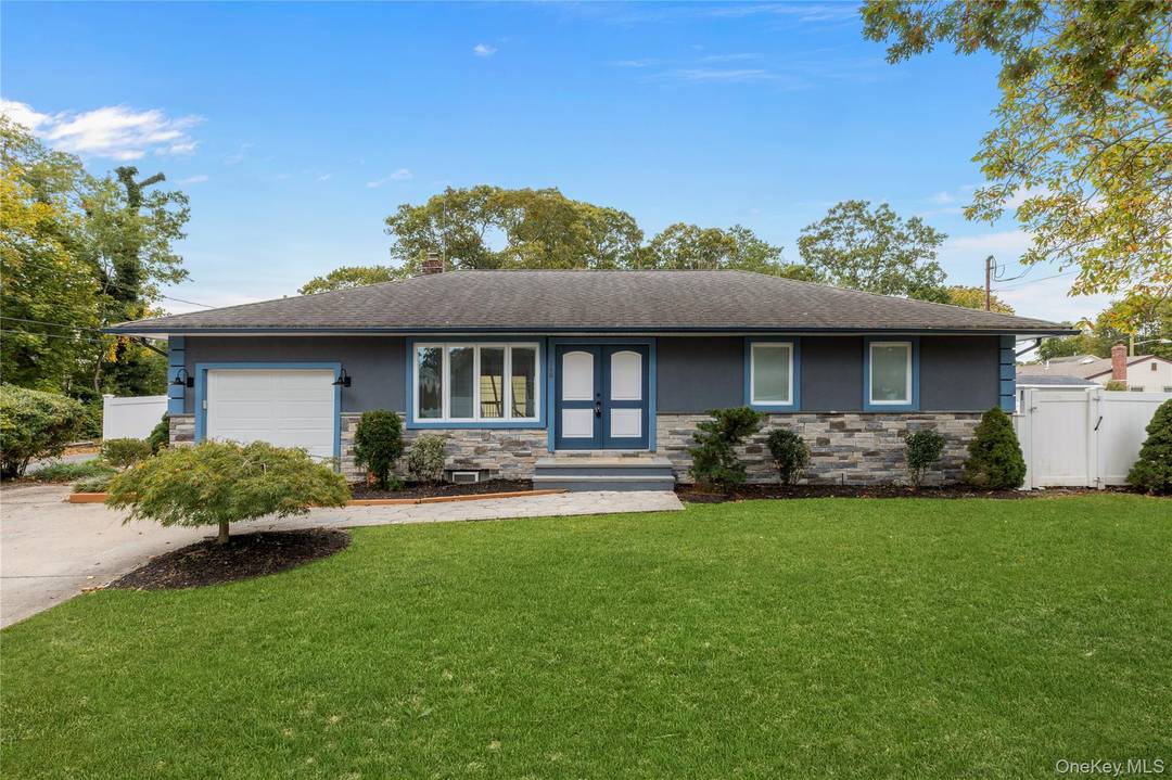 Discover this beautifully renovated 4 bedroom, 2 bathroom ranch, ideally positioned on a sought after corner lot in Holbrook.