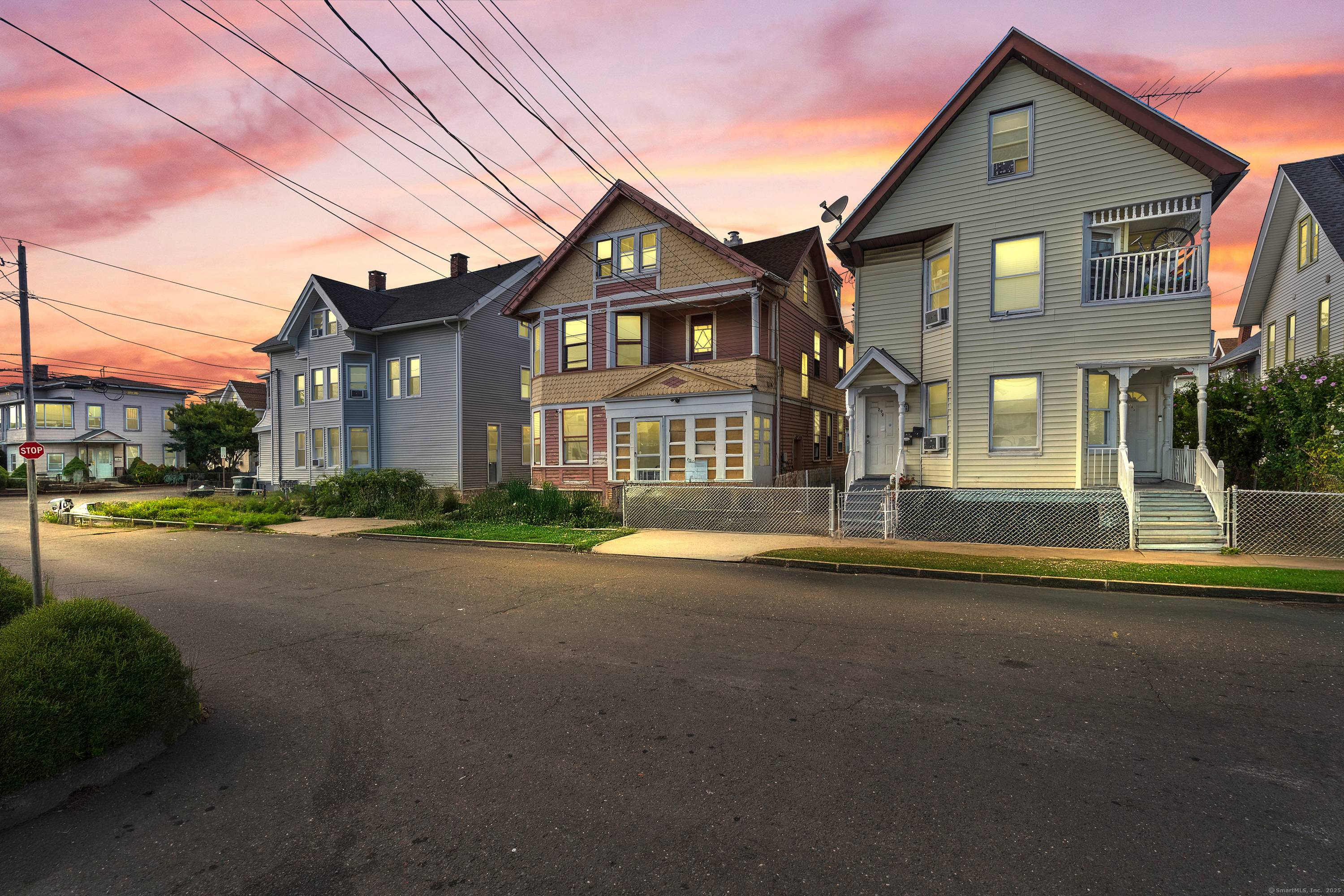 Welcome to 295 Shelton Street, a well positioned 3 family property featuring three spacious 2 bedroom, 1 bath units.