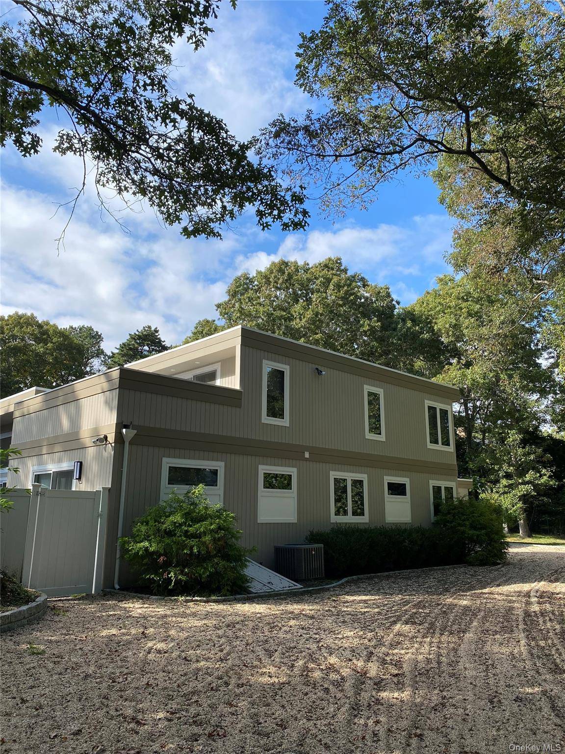 Quiet cul de sac in the Village of Quogue with Quogue Beach use.