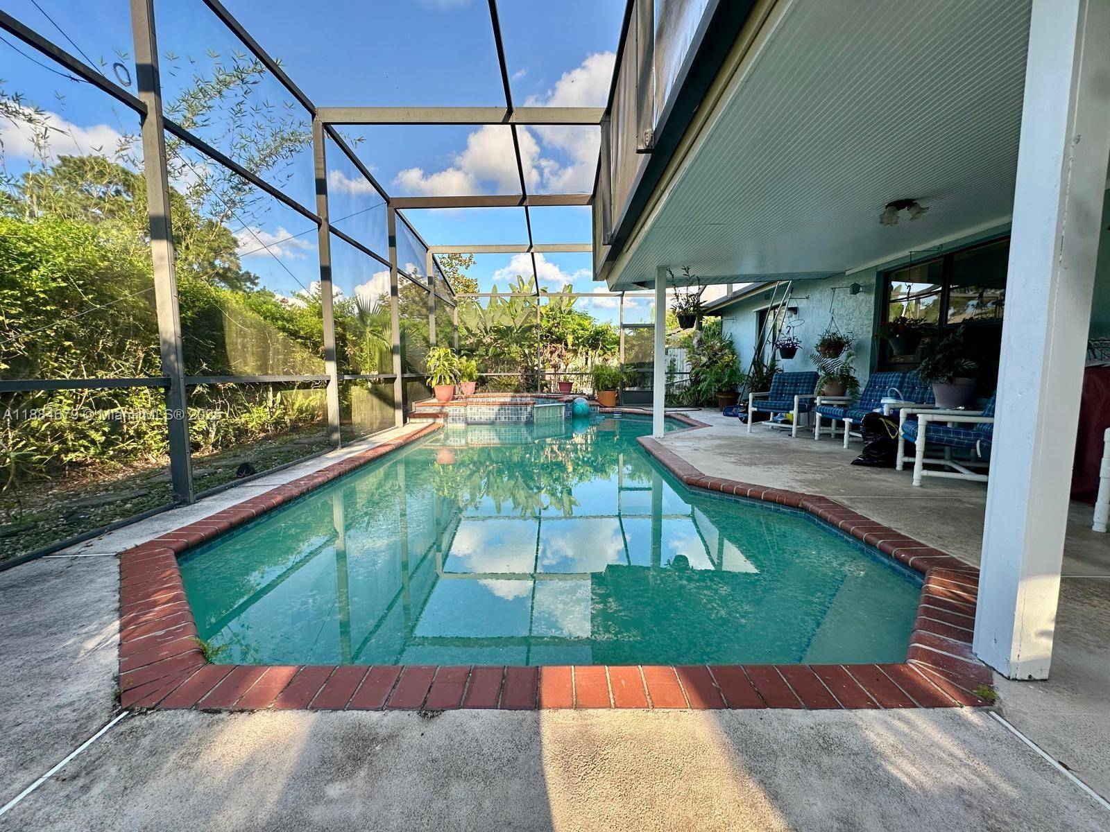 JUST REDUCED. Corner lot in sought after Hunters Trace offering plenty of space and potential with a split floor plan and inviting outdoor retreat.