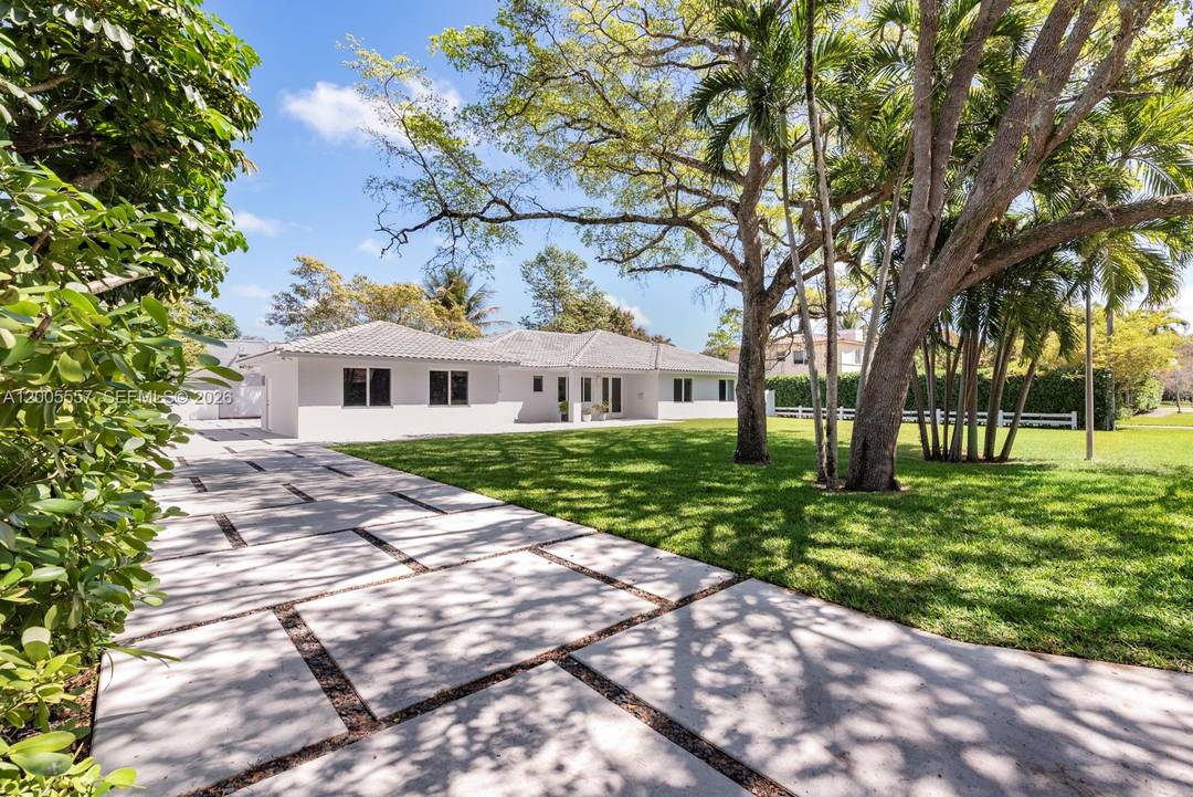 Designed and built by a contractor for himself, this exceptional Biscayne Park home reflects thoughtful design, premium materials, and timeless quality at every turn.