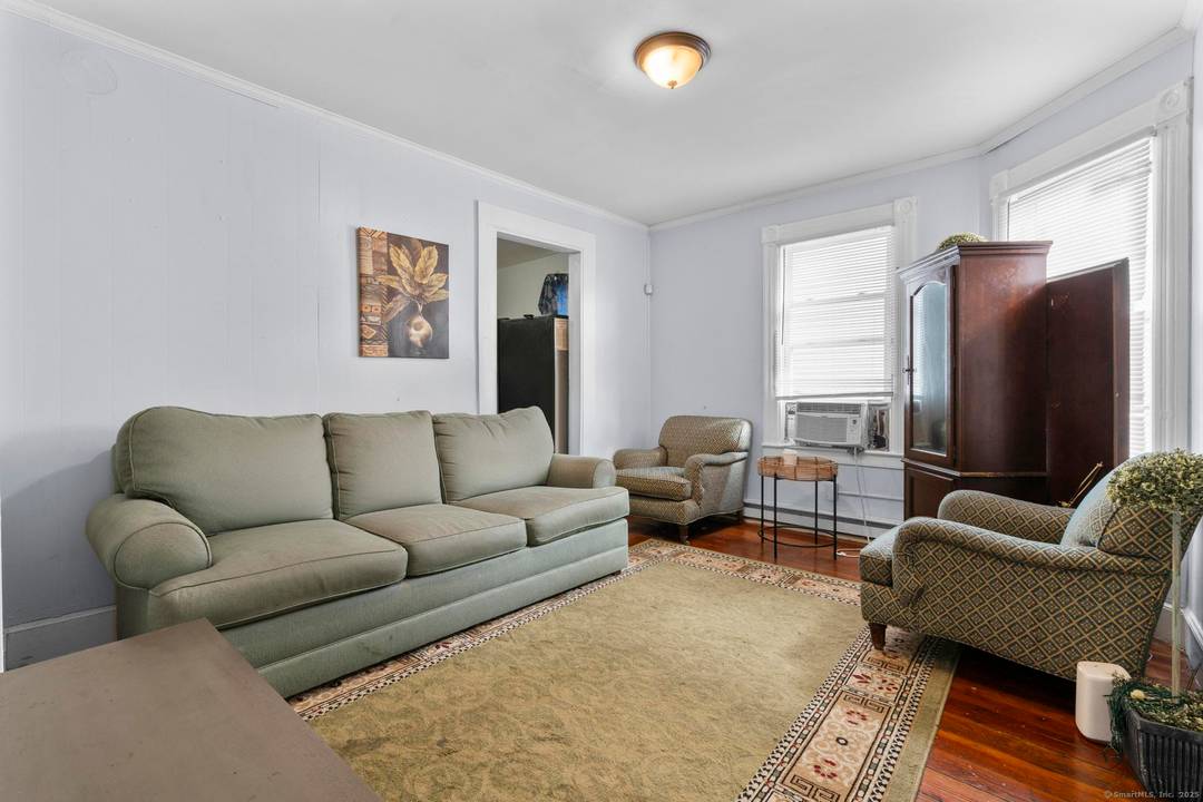 Cash flowing, well maintained 3 family property in the North End of Waterbury.