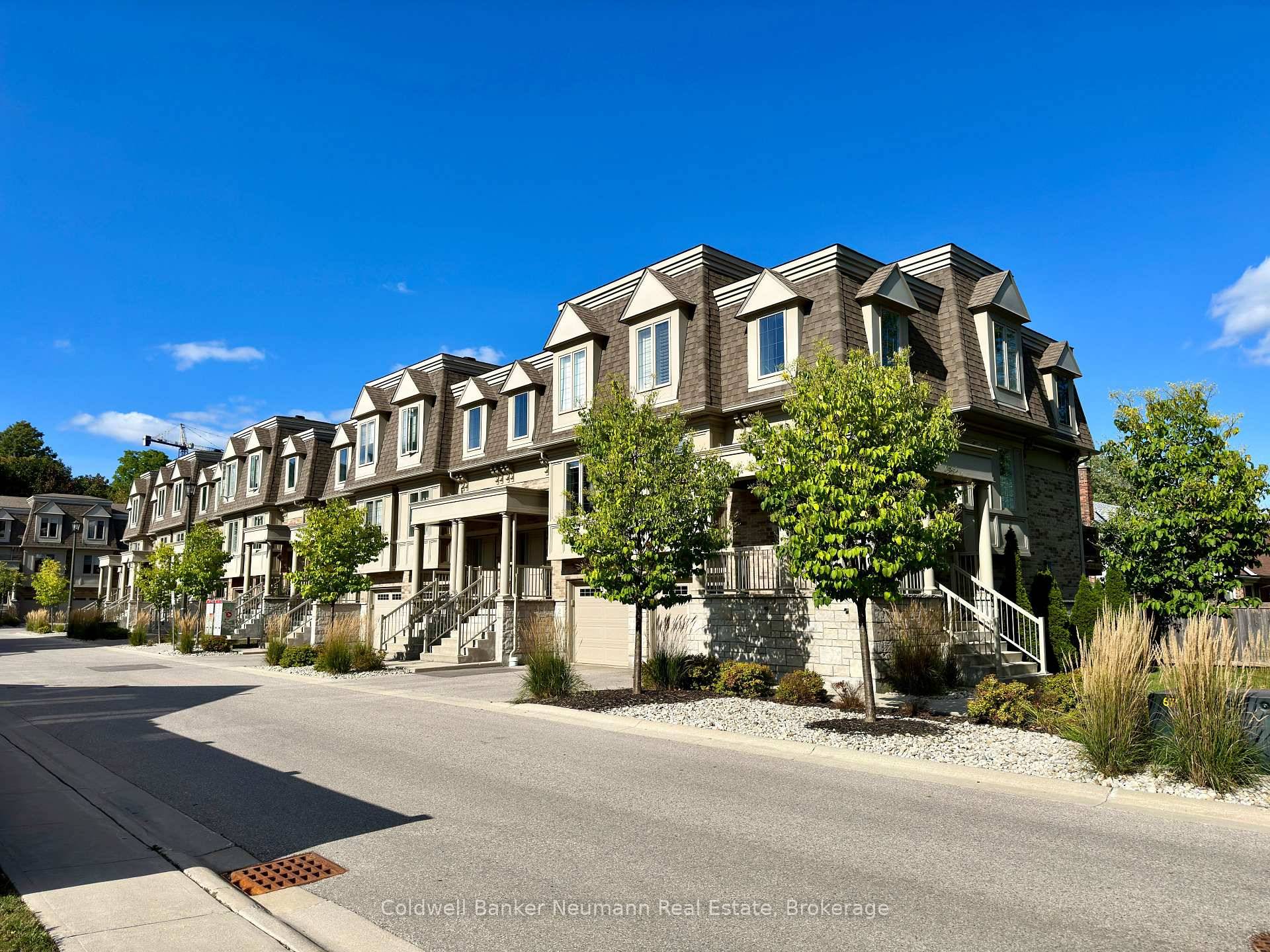 Welcome to one of Guelph's most upgraded end unit townhomes 1, 596 sq.