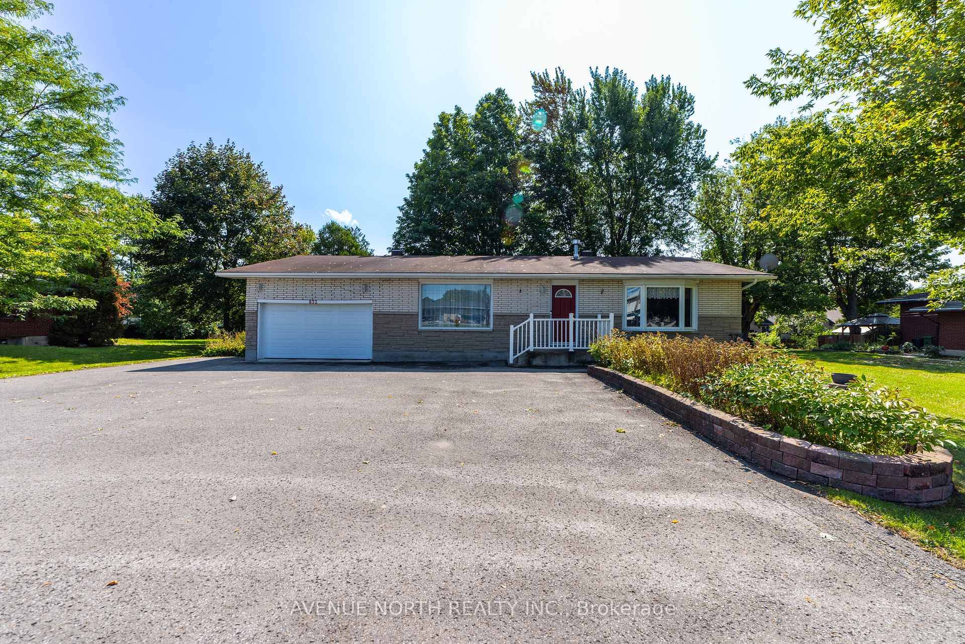 Welcome to this spacious and versatile detached bungalow with a two car garage, situated on a large lot with a generous rear yard.