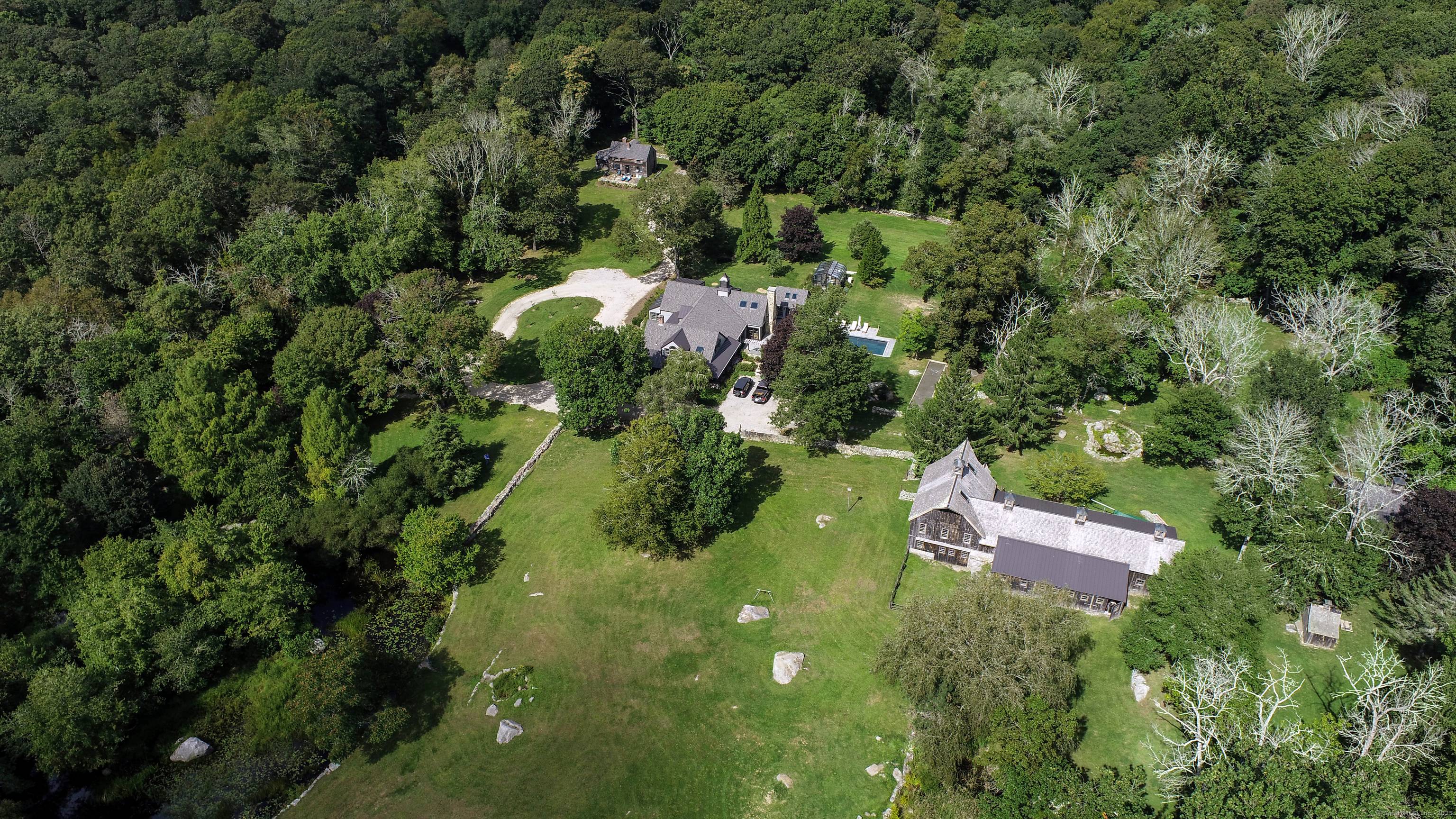 Welcome to 262 Cove Road, a reimagined 1740 Gentlemen's Farm that artfully blends historic charm with modern luxury.