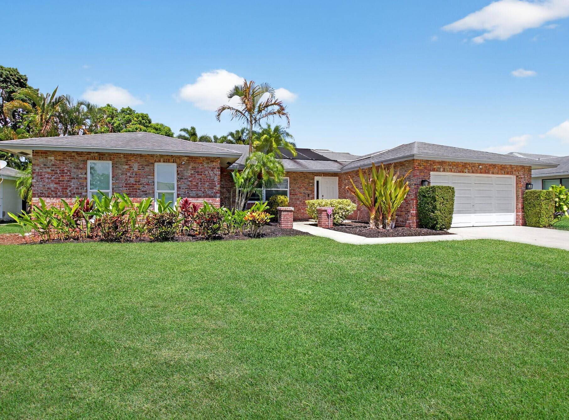 Welcome to this meticulously maintained 4 bedroom, 2 bath single family home with a sparkling pool and spacious 2 car garage, perfectly situated in one of Boca Raton's most desirable ...
