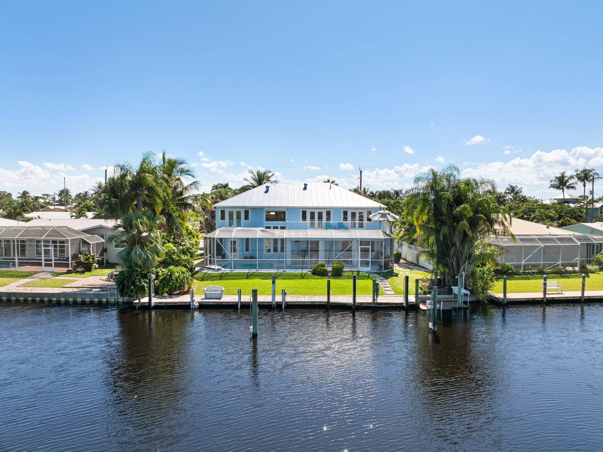 Beautifully maintained 2 story waterfront home in the highly sought after community of Lighthouse Point.