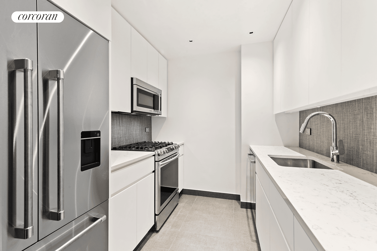 Stunning corner 1BR 1. 5BA Dining Area with brand new kitchen at Kenton Place, a highly sought after luxury high rise on East 63rd Street.