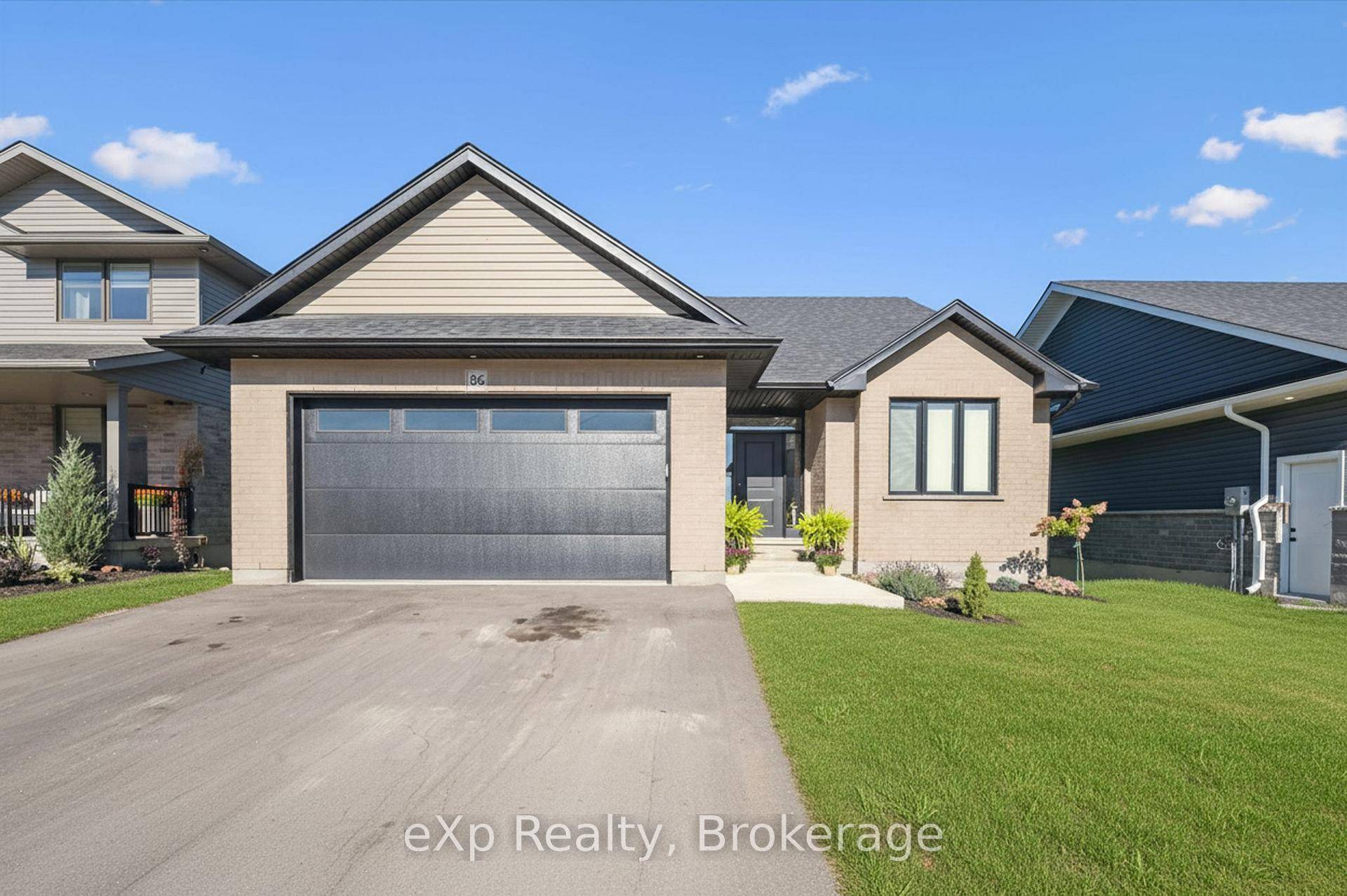 Stunning 2024 Keating built raised bungalow backing onto open fields with peaceful views and gorgeous sunsets.