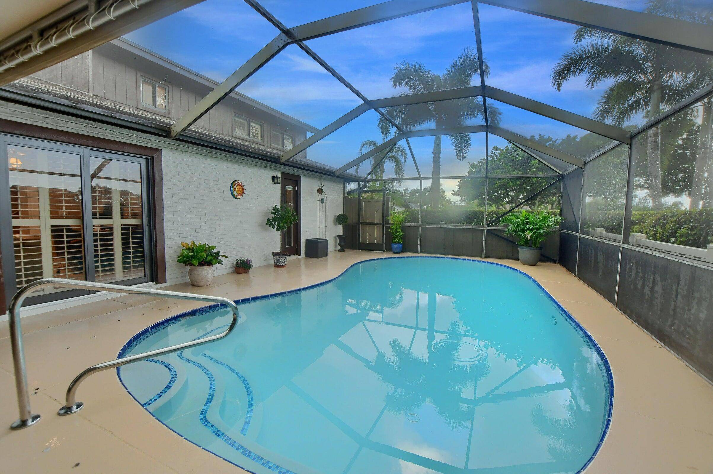 Move In Ready Townhouse in Boca Gardens with Scenic Lake Views !