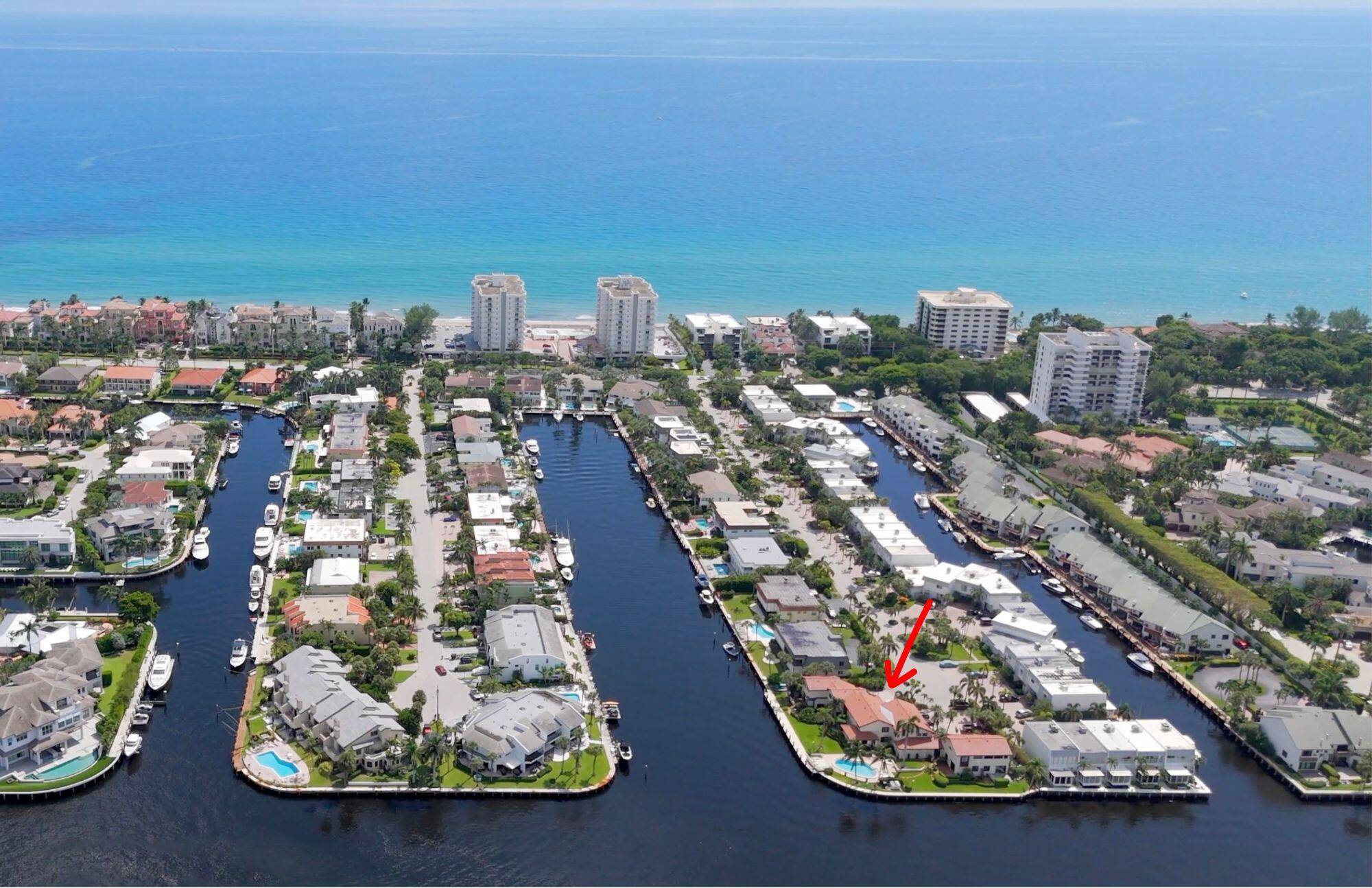 Rarely available 2 story upgraded townhouse on a premier point lot in exclusive Highland Beach, with dockage and beach access !