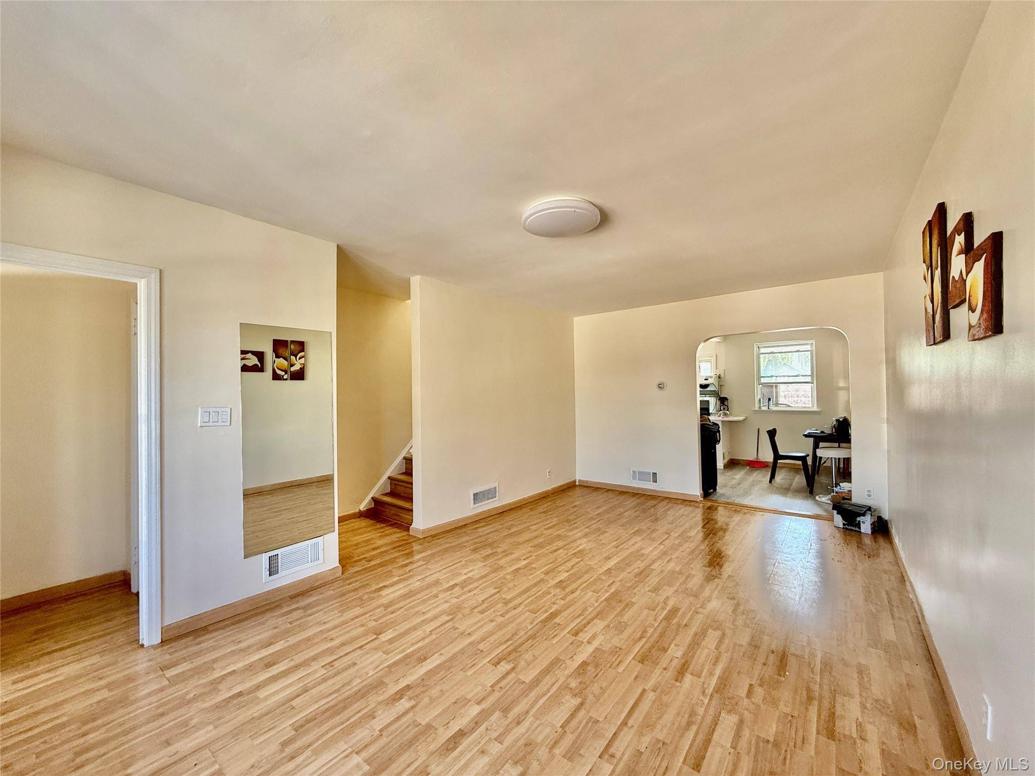 Charming All Brick Attached Townhouse in Prime North Flushing This well maintained tri level 1 family home features a spacious layout with a large living room, an eat in kitchen ...