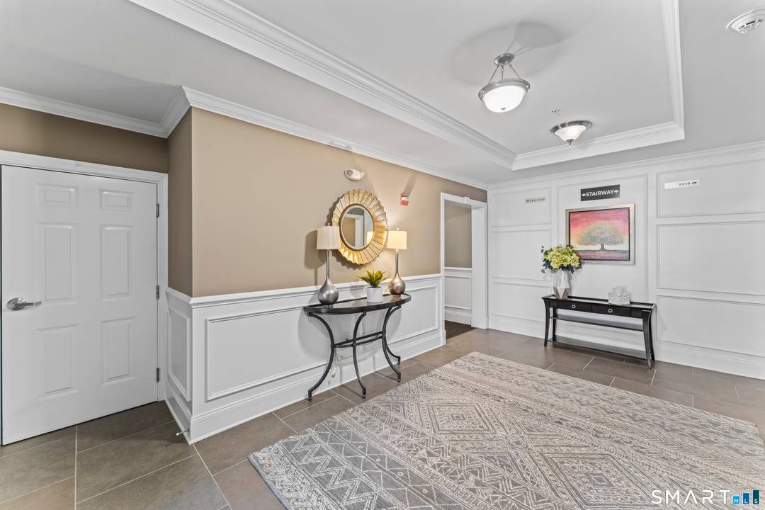 Welcome to 1211 Brookside Court, an exceptional opportunity within the highly desirable Newtown Woods Regency Collection, a 55 active adult community offering low maintenance, resort style living.