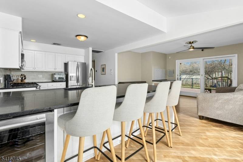 A beautifully inviting Mid Century home offering the clean lines, warm light, and effortless flow that define the era.