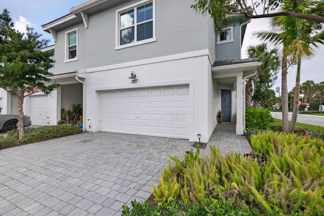 Located in the gated community of Sandpiper Pointe, this 2 story luxury townhome built in 2023 offers 3 bedrooms plus a spacious loft, 2.